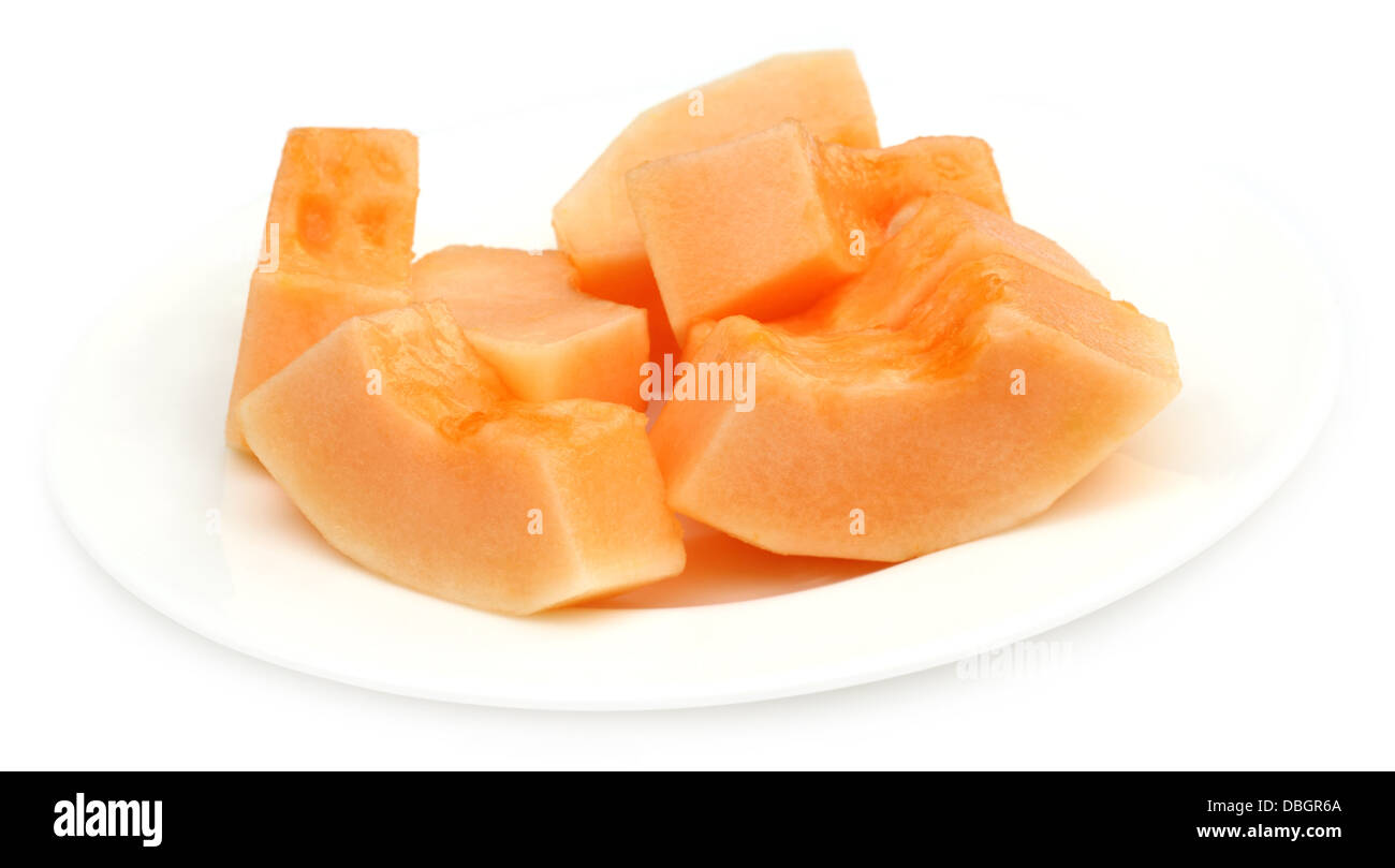 Cucumis melo melon ou sur une plaque Banque D'Images