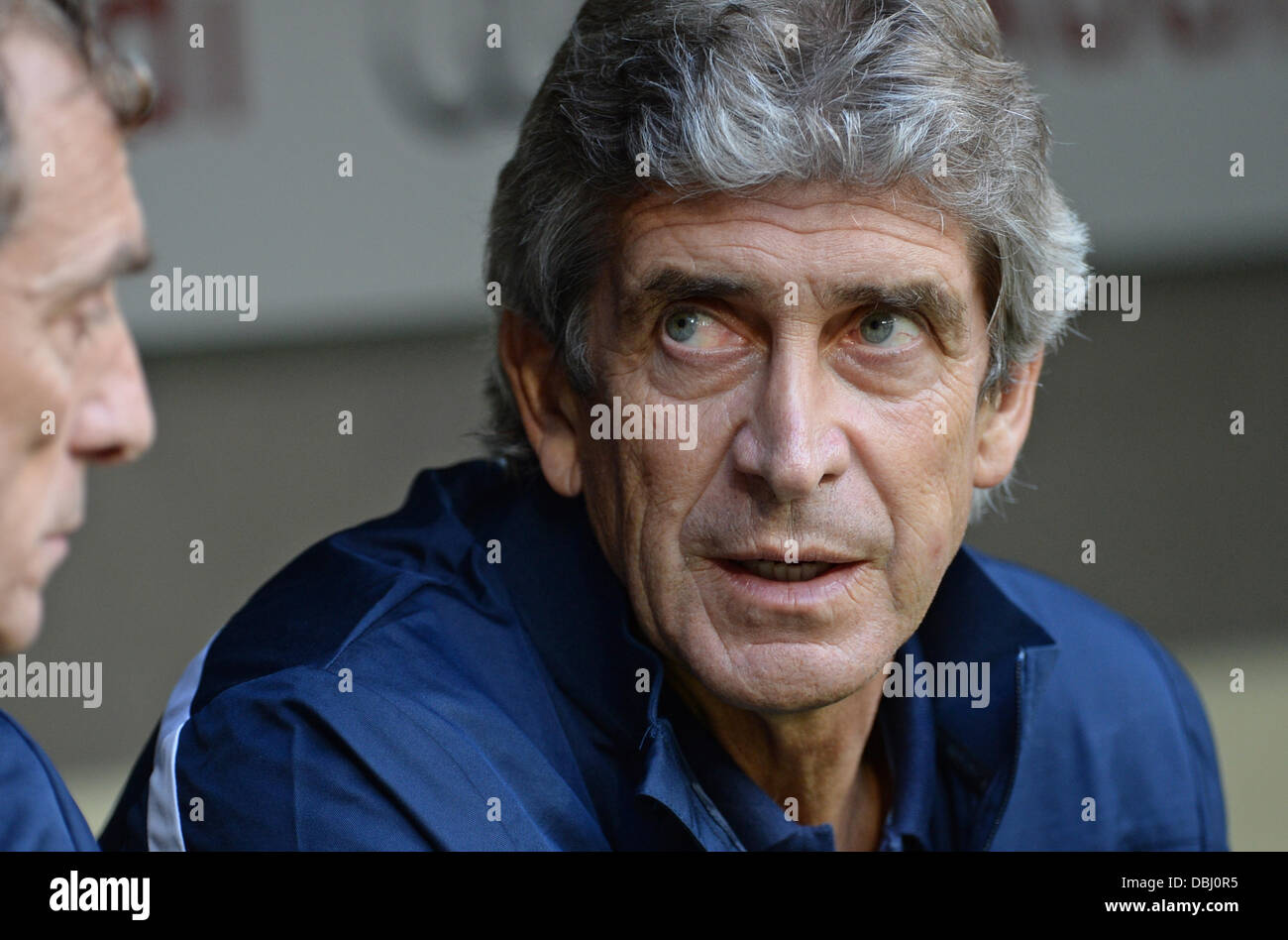 Munich, Allemagne. 31 juillet, 2013. L'entraîneur-chef de Manchester Manuel Pellegrini sur le banc au cours de l'Audi Cup demi-finale de football Manchester City contre l'AC Milan à l'Allianz Arena de Munich, Allemagne, le 31 juillet 2013. Photo : Andreas Gebert/dpa/Alamy Live News Banque D'Images