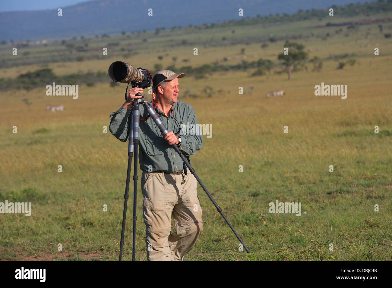 Photographe Nature Wayne Hughes travaillant dans l'Ol Kinyei Conservancy près du Masi Mara. Le Kenya, l'Afrique. Banque D'Images