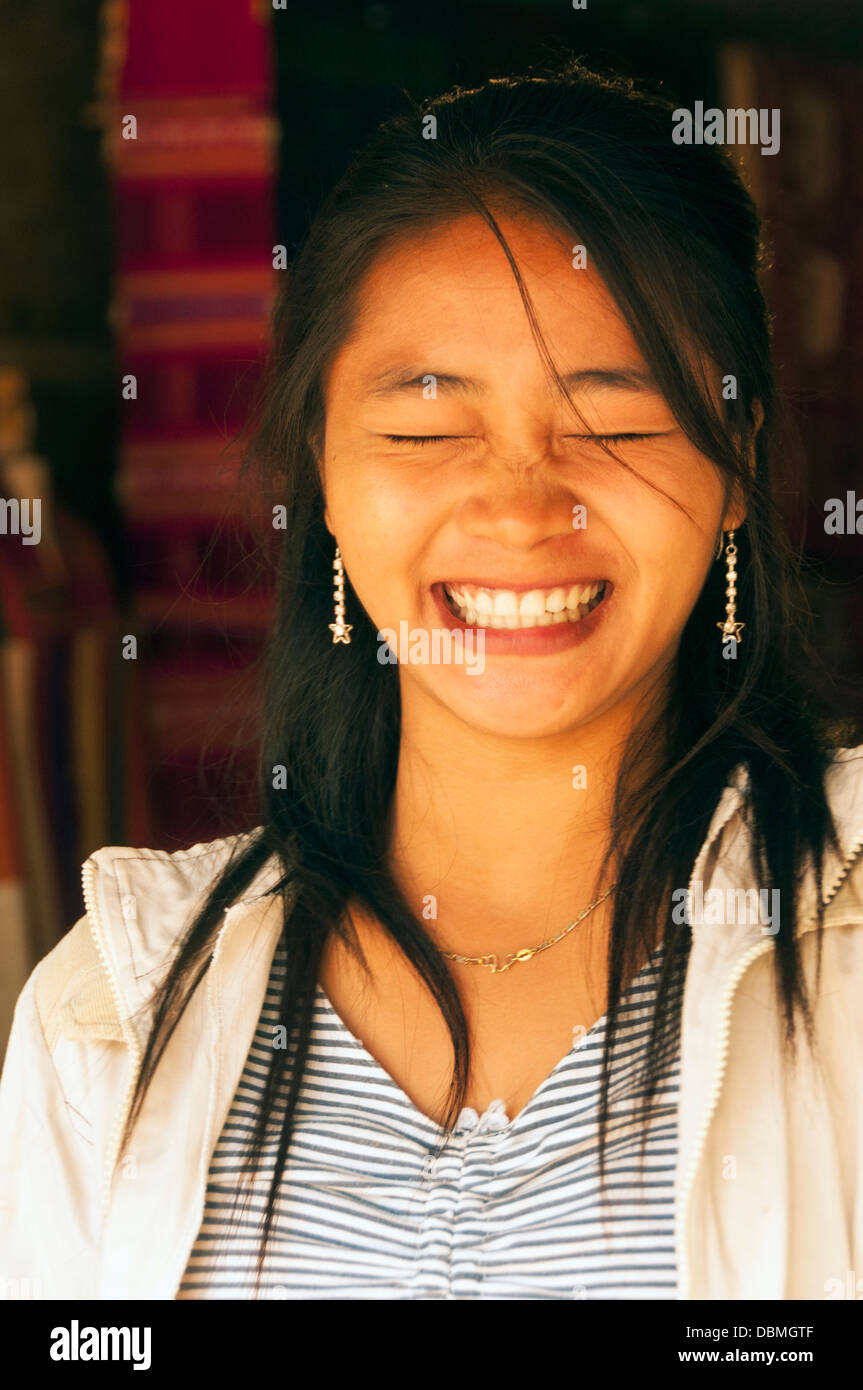 Elk209-1023v Laos, Luang Prabang, Laos girl smiling Banque D'Images