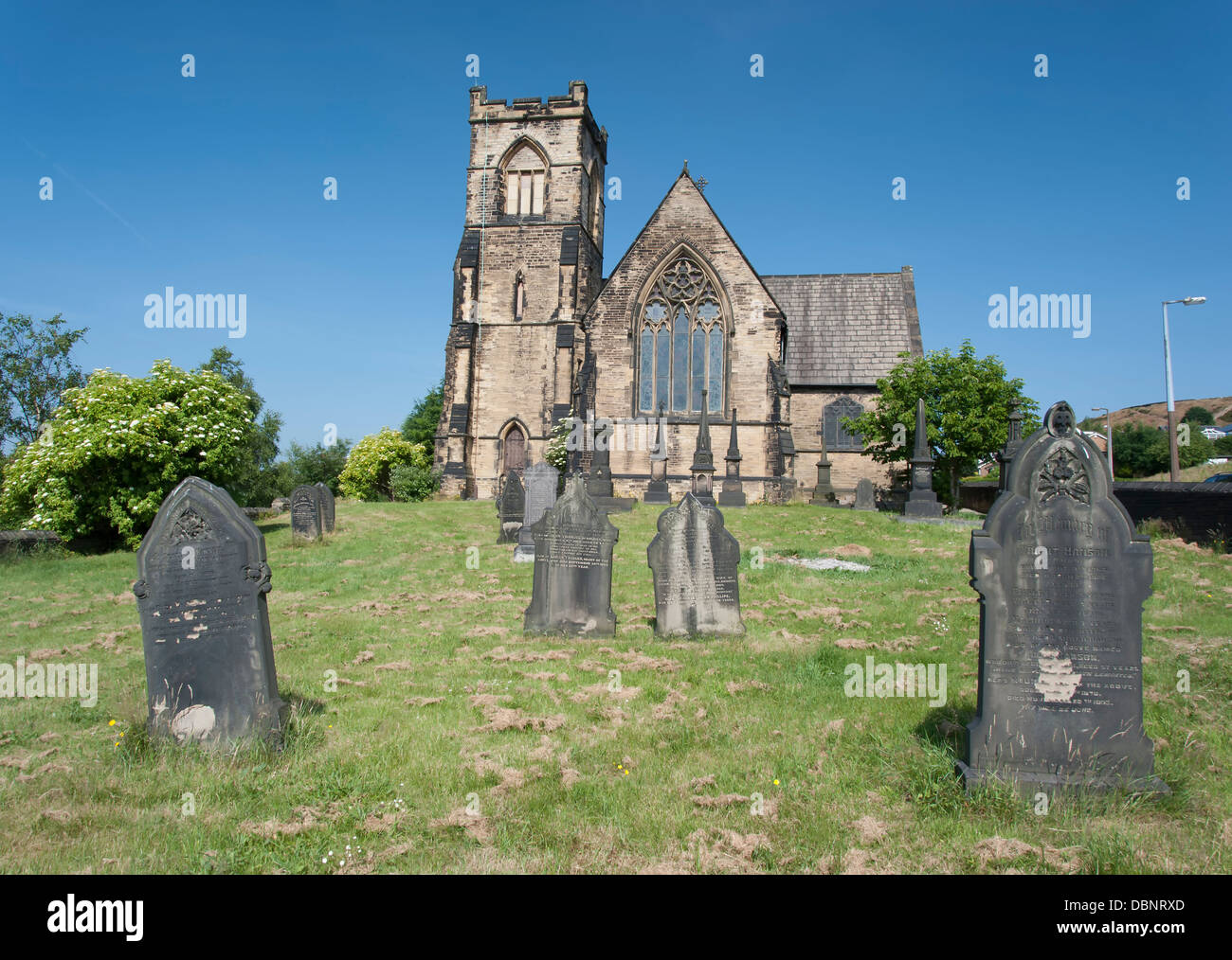 Cimetière et église méthodiste construit dans un style gothique Banque D'Images