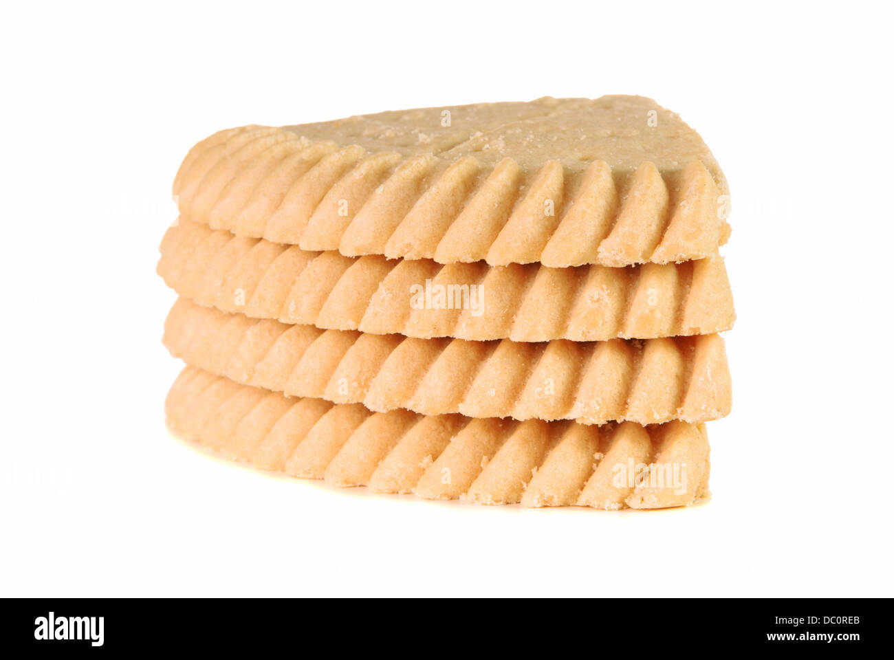 Pile de quatre morceaux de shortbread sur fond blanc Banque D'Images