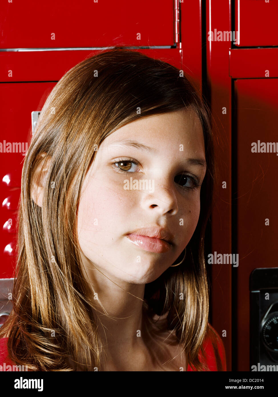 Girl in school locker room, portrait Banque D'Images