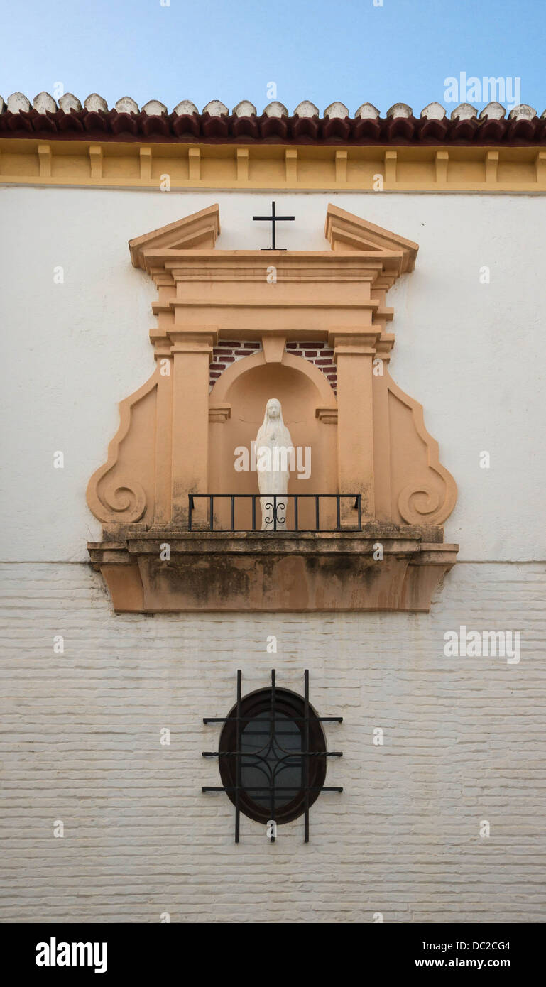 Statue de la Vierge dans une niche, quartier de l'Albayzin, Granada, Espagne Banque D'Images