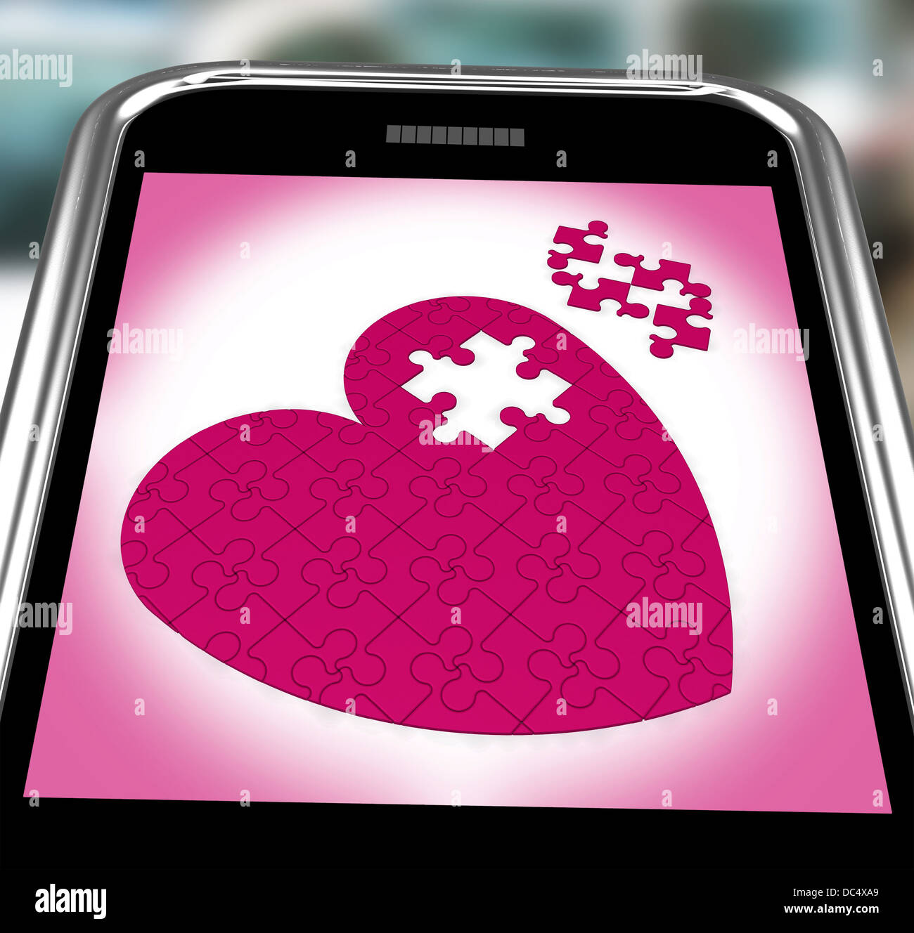 Puzzle Coeur sur Smartphone montrant Engagement Banque D'Images