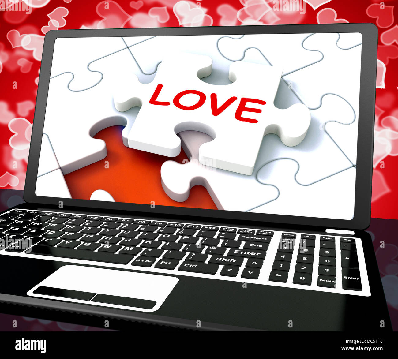 Love Puzzle sur Internet montre l'ordinateur portable Banque D'Images