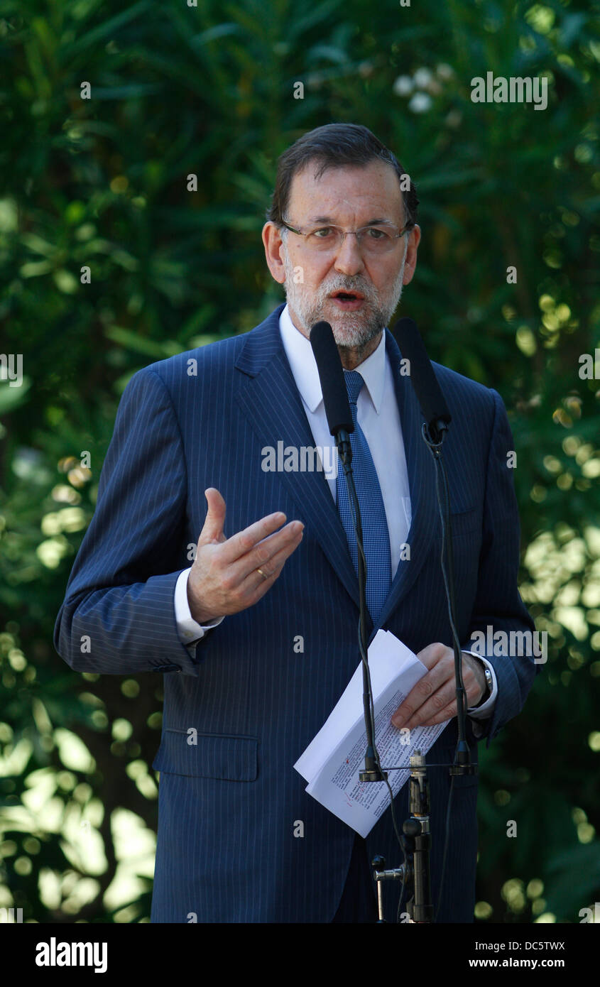 Mallorca, Espagne. 9 août 2013. Le premier ministre Espagnol Mariano Rajoy parle de presse après une réunion au palais de Marivent dans l'île espagnole de Majorque, le 9 août, 2013. Des problèmes tels que les récentes crises de Gibraltar entre l'Espagne et le Royaume-Uni ou les problèmes sociaux ont été traités au cours de cette réunion d'été. Credit : zixia/Alamy Live News Banque D'Images