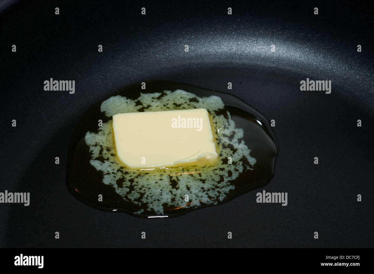 Butte Est En Train De Fondre De La Chaleur D Un Poele Photo Stock Alamy