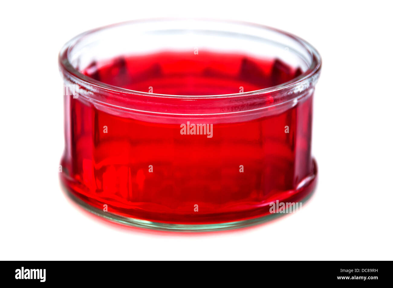 La gelée rouge sur un récipient en verre Banque D'Images