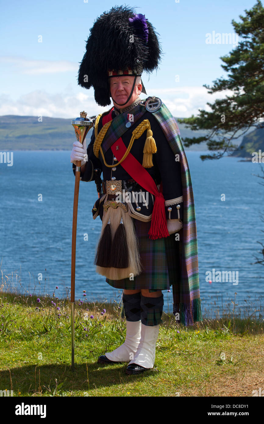 Peter MacDonald gaiteiro tambour-major à l'île de Skye Scottish Highland Games a tenu à Portree, Ecosse, Royaume-Uni Banque D'Images