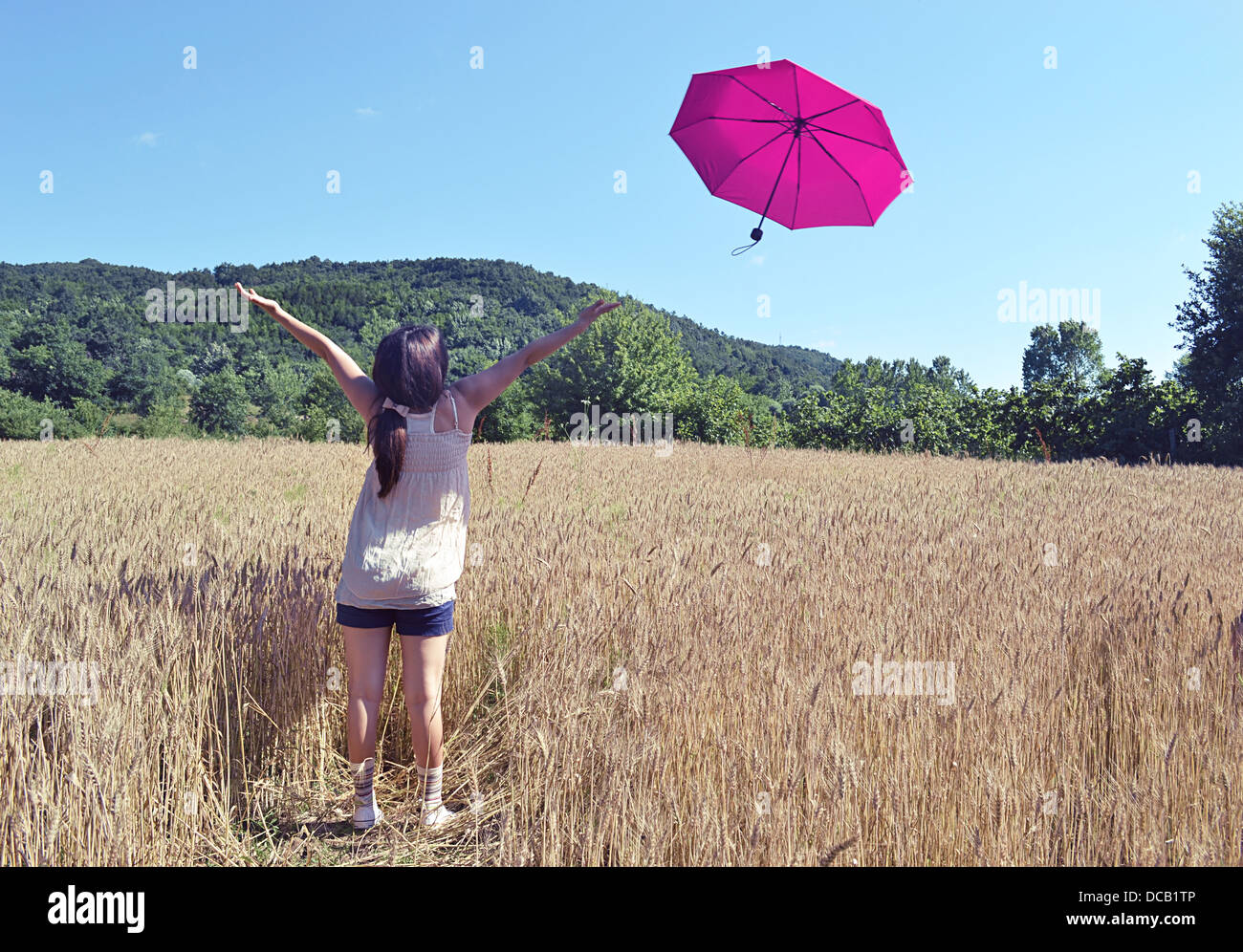 La nature, la main de l'homme, d'un parasol Banque D'Images