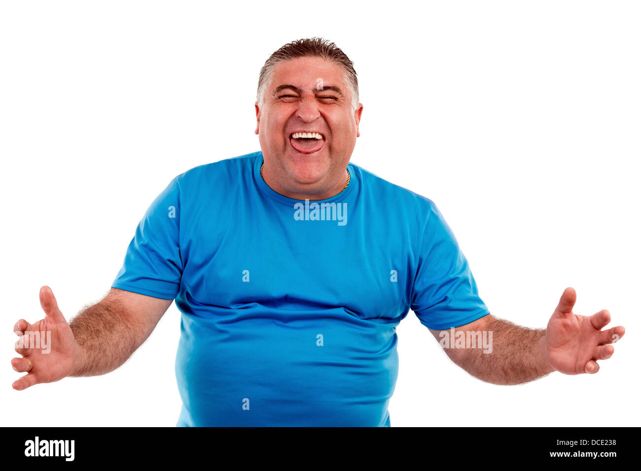 Un homme riant hystériquement à quelque chose d'hilarant avec un drôle d'expression sur son visage. Banque D'Images