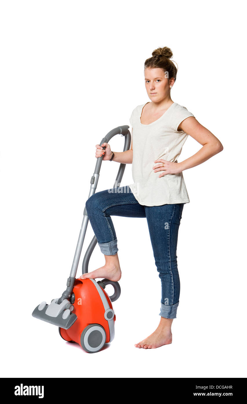 Woman with vacuum cleaner Banque D'Images