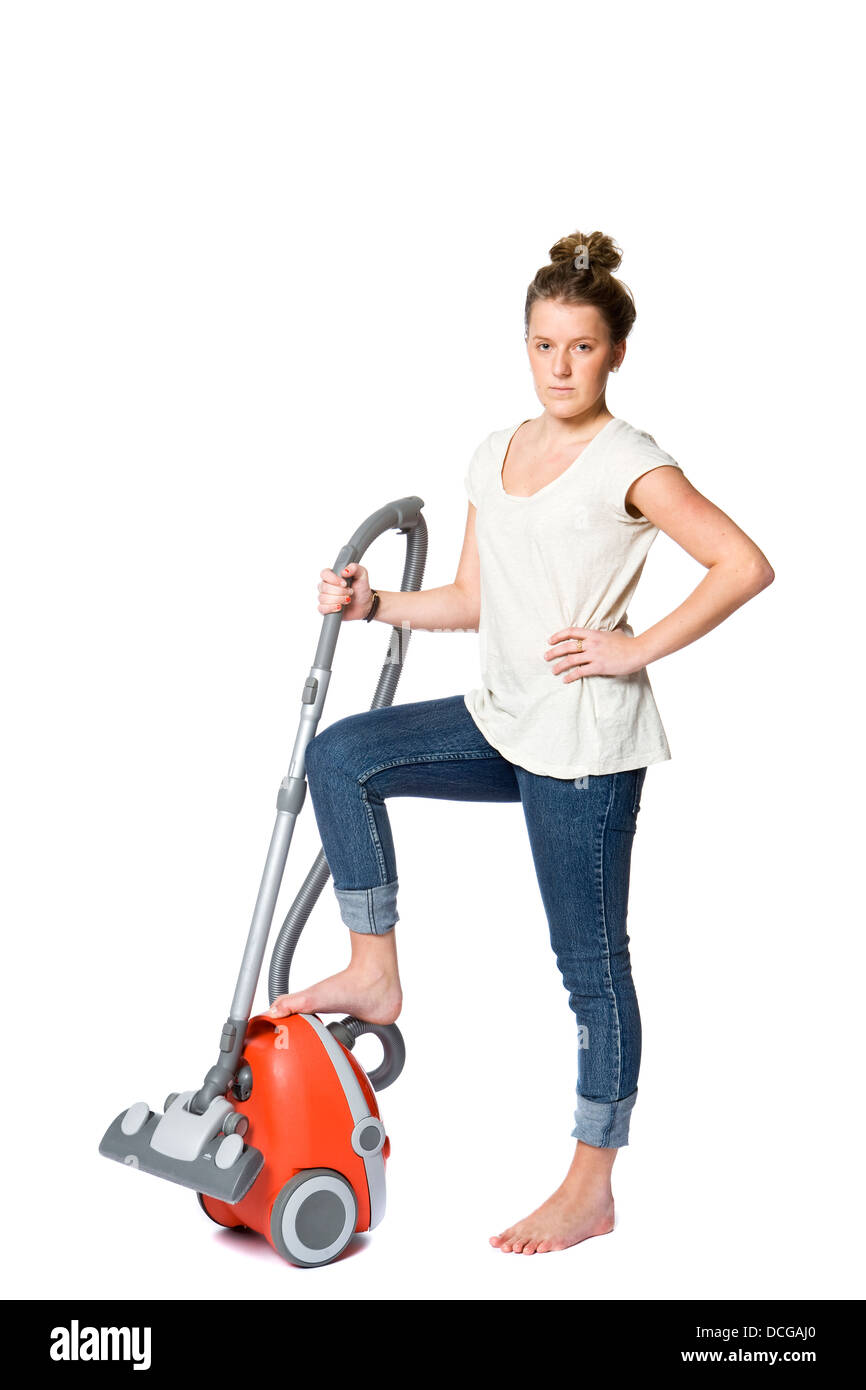 Woman with vacuum cleaner Banque D'Images