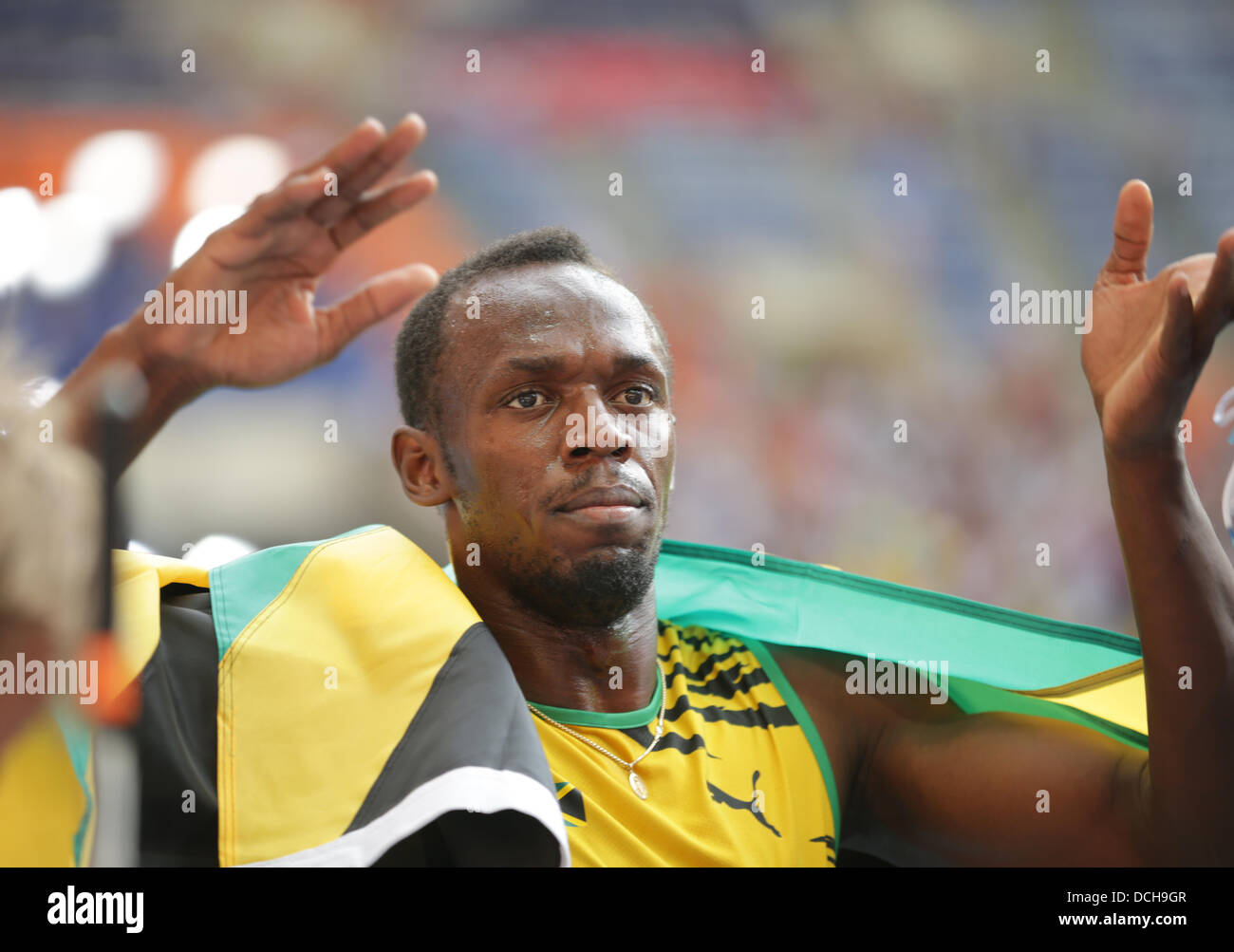 Usain Bolt de la Jamaïque réagit après les hommes Relais 4x100m à la 14e Finale es Championnats du monde d'athlétisme au stade Luzhniki de Moscou, Russie, 18 août 2013. Photo : Michael Kappeler/dpa  + + +(c) afp - Bildfunk + + + Banque D'Images