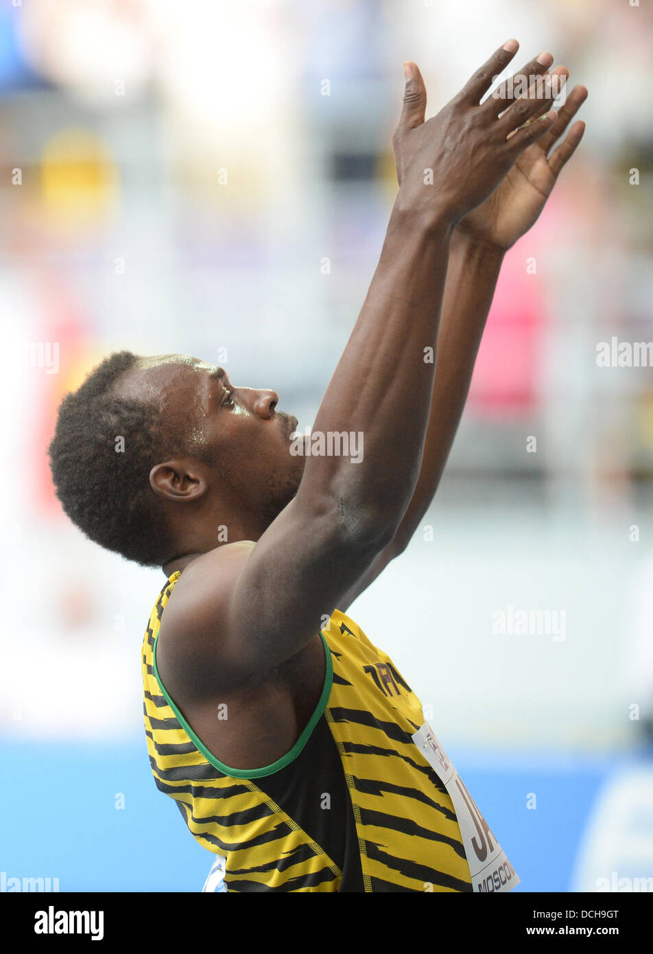 Usain Bolt de la Jamaïque réagit après les hommes Relais 4x100m à la 14e Finale es Championnats du monde d'athlétisme au stade Luzhniki de Moscou, Russie, 18 août 2013. Photo : Bernd Thissen/dpa Banque D'Images