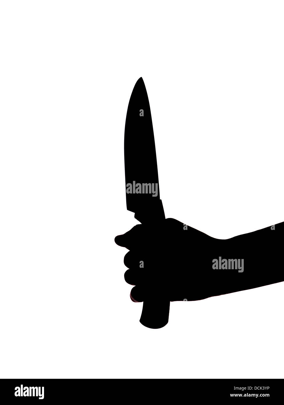 Silhouette d'une main tenant un couteau de cuisine Banque D'Images