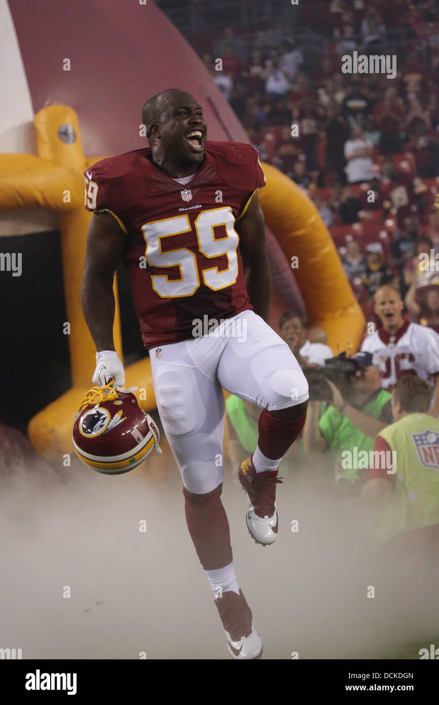 Landover, MD, USA. Août 19, 2013. 19 août 2013, Landover, MD, FedEx Field Redskins de Washington prendre sur les Pittsburgh Steelers dans le deuxième match de football d'avant-saison. London Fletcher est introduit et obtient l'équipe et fans fired up avant le match. Rendez-vous sur Redskins pour vaincre les Steelers 24-13. © Sykhammountry Khamp/Alamy Live News Banque D'Images