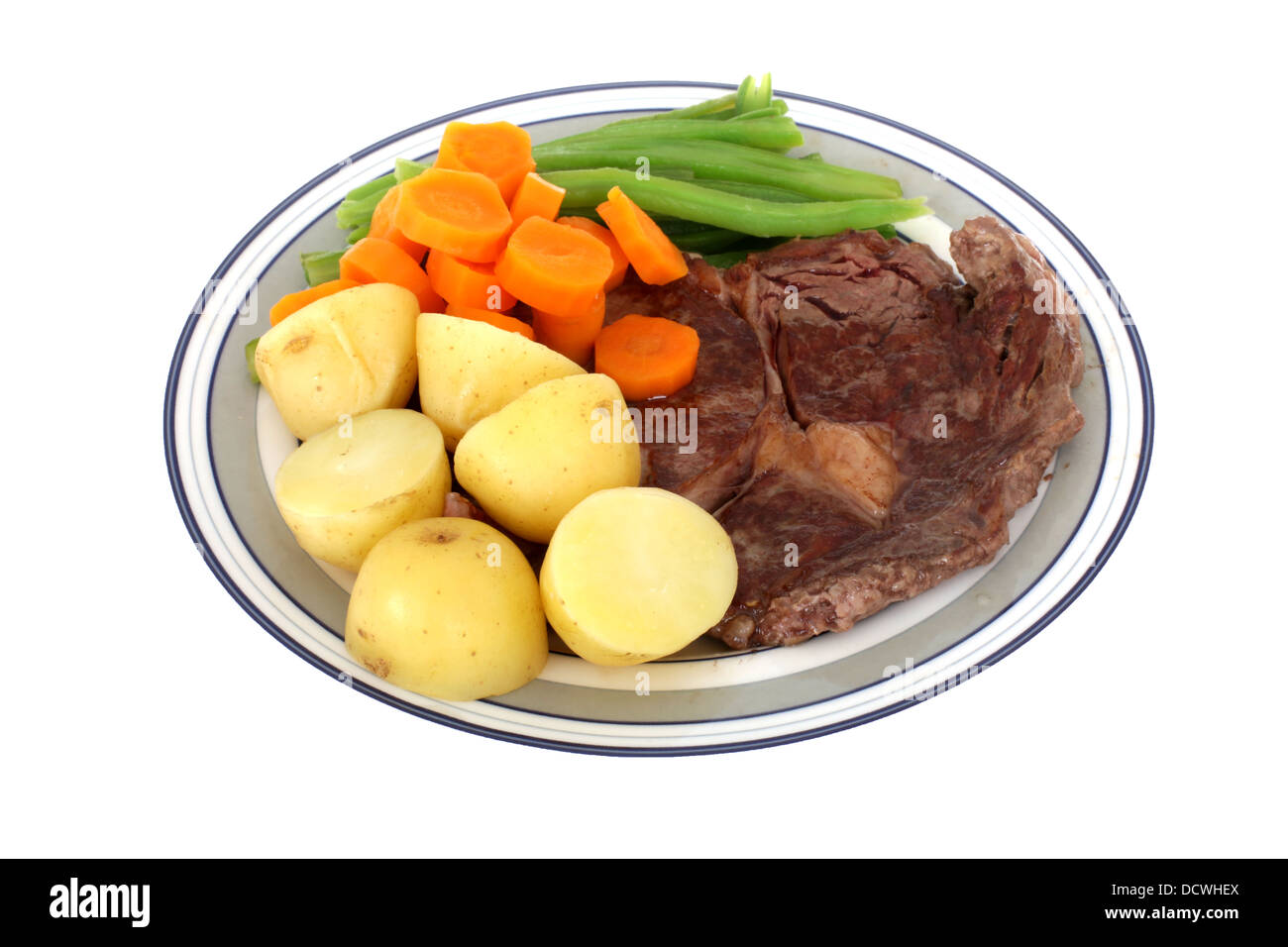 Bon Repas de steak RIbeye grillé avec des légumes vapeur Banque D'Images