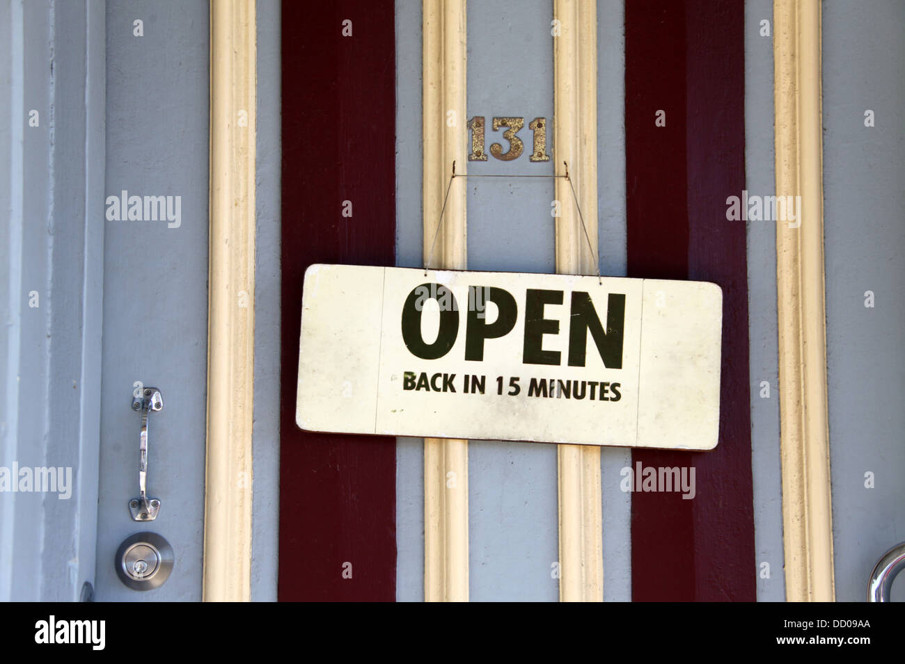 Dos ouvert en 15 minutes porte sur un magasin signe Banque D'Images