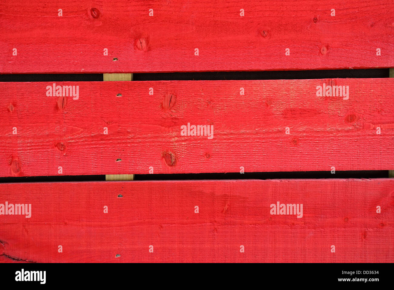Des planches de bois coloré en rouge Banque D'Images