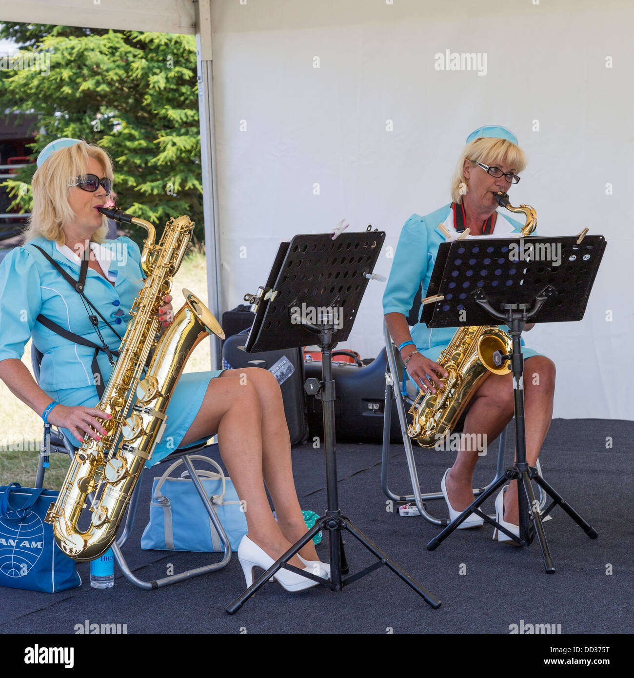 Les membres du quatuor de saxophones de la Pan Am à l'exécution 2013 Goodwood Festival of Speed, Sussex, UK Banque D'Images