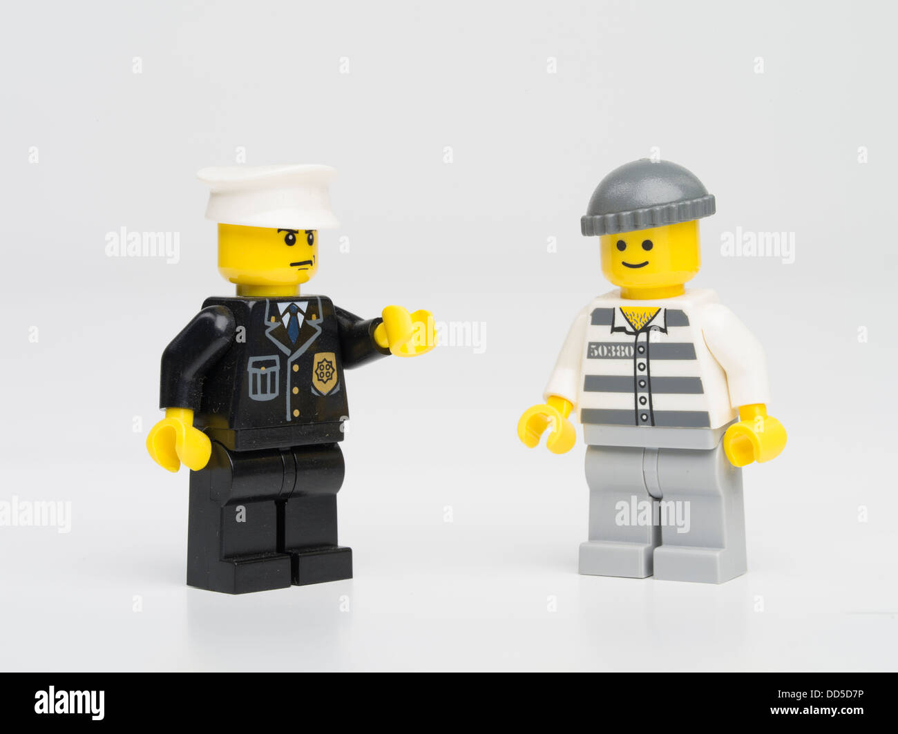 Agent de police Lego / garde avec prisonnier Banque D'Images