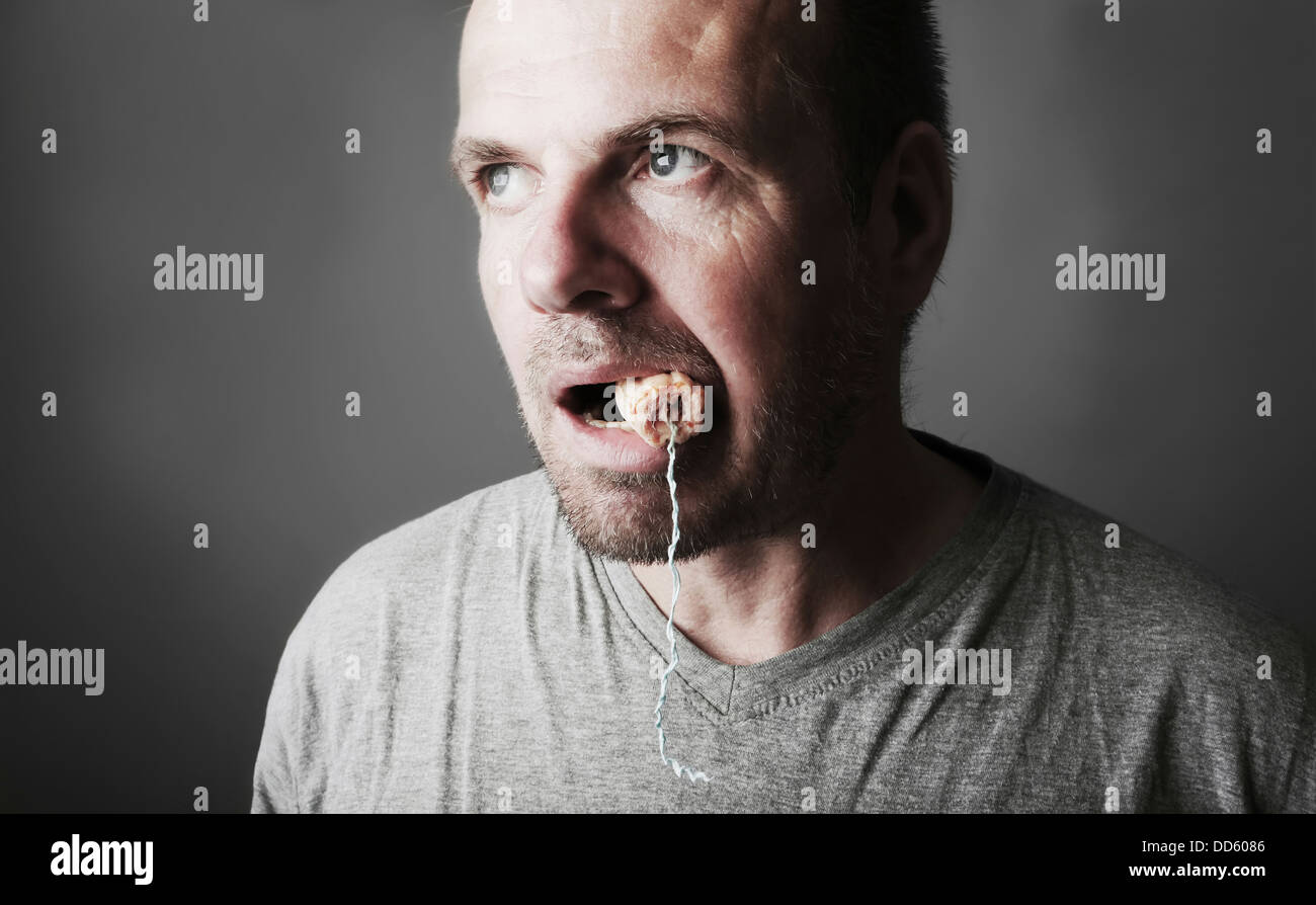 Mature man with used tampon in his mouth Banque de photographies et  d'images à haute résolution - Alamy