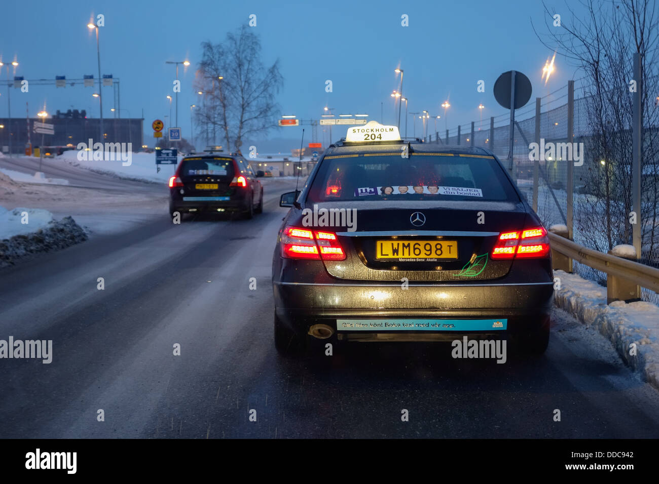 Stockholmtaxi par mauvais temps Banque D'Images