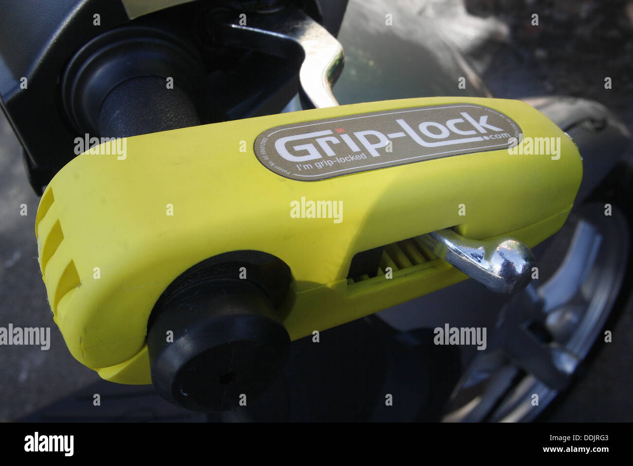 Serrure-poignée protection anti-vol de papillon de scooter Banque D'Images