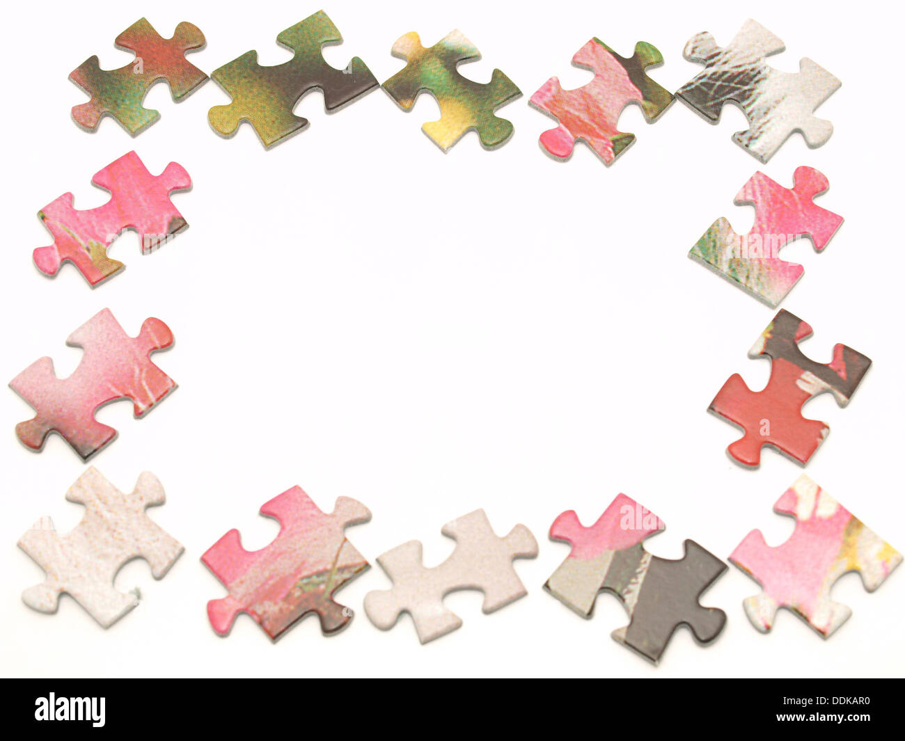 Pièces du puzzle sur un fond blanc Banque D'Images