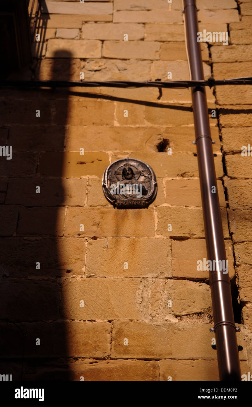 Un signe d'Olite Jésus dans la rue. Il est dit "Reinaré" et cela veut dire 'Je règle'. Banque D'Images