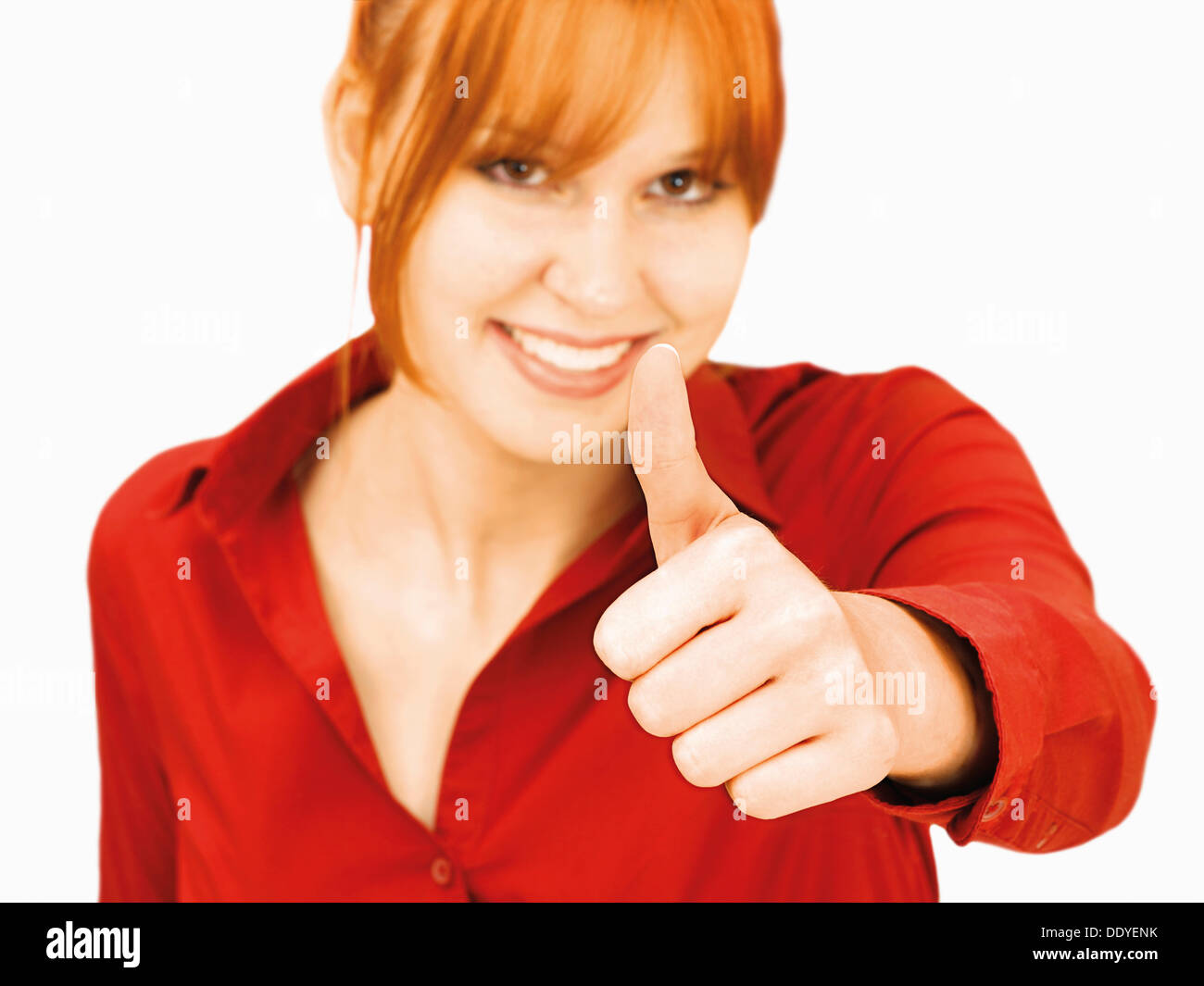 Cheerful young woman making Thumbs up geste Banque D'Images