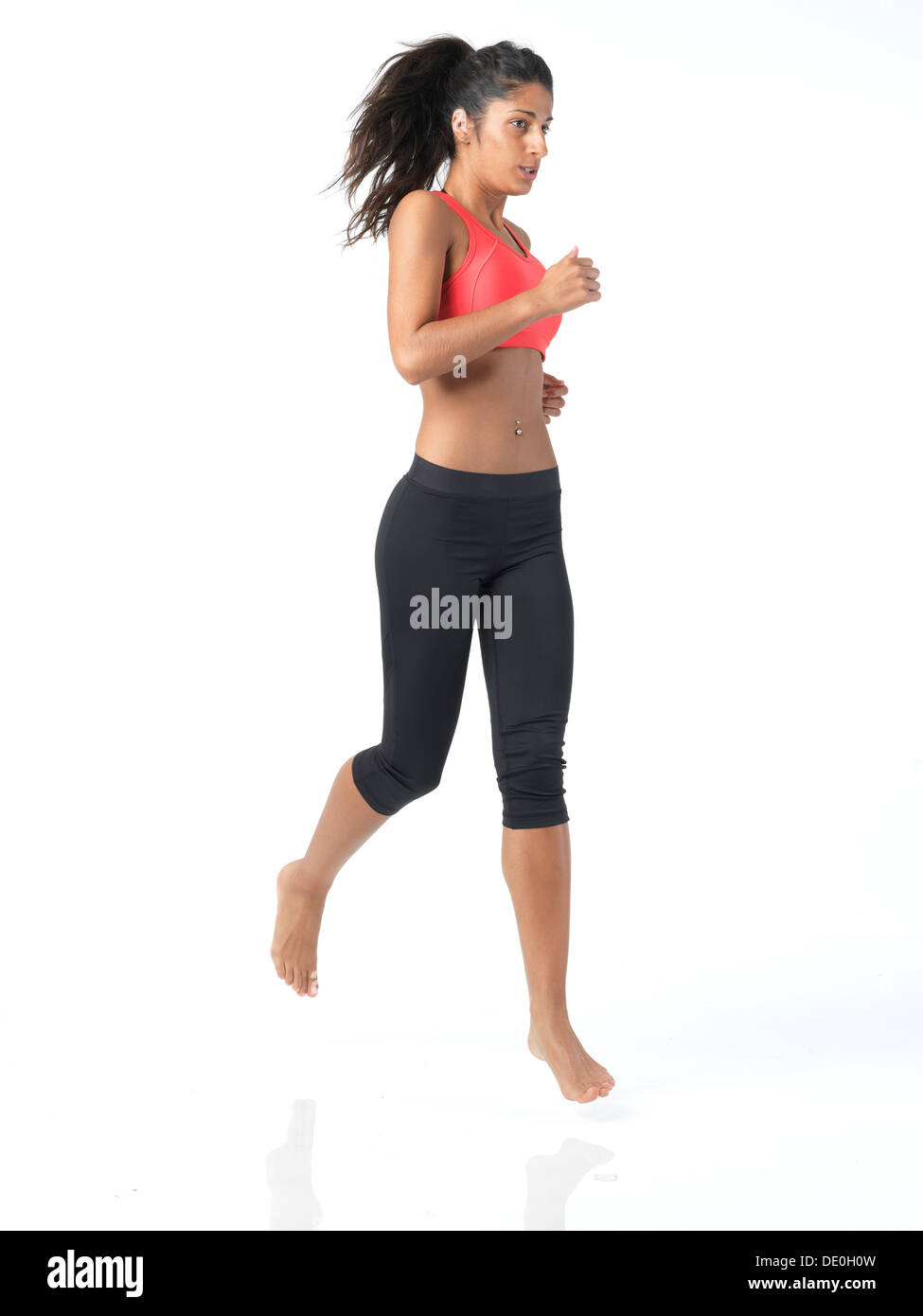 Fit woman on white Banque D'Images
