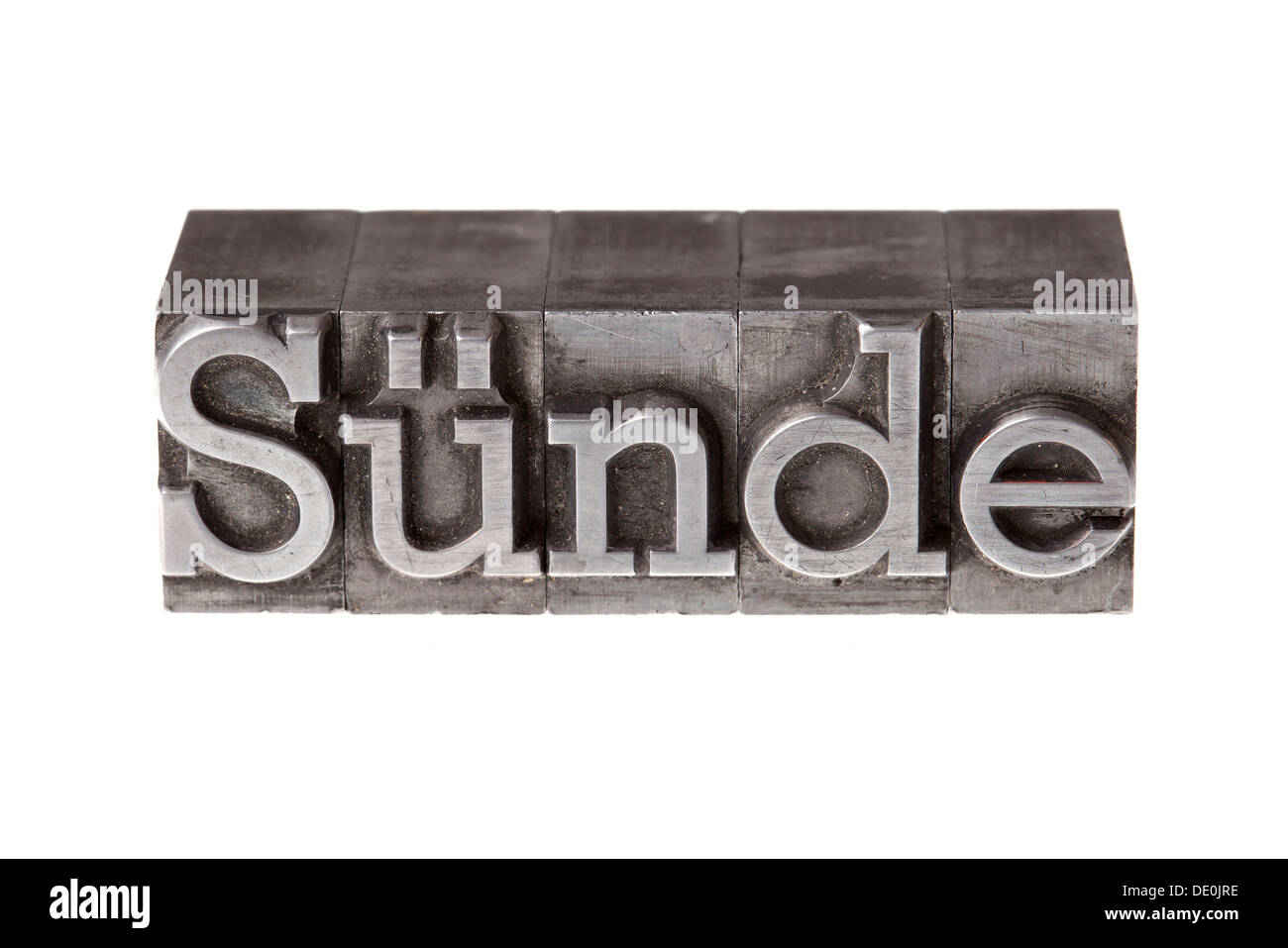 Plomb ancien lettres formant le mot "uende', l'allemand pour le péché Banque D'Images