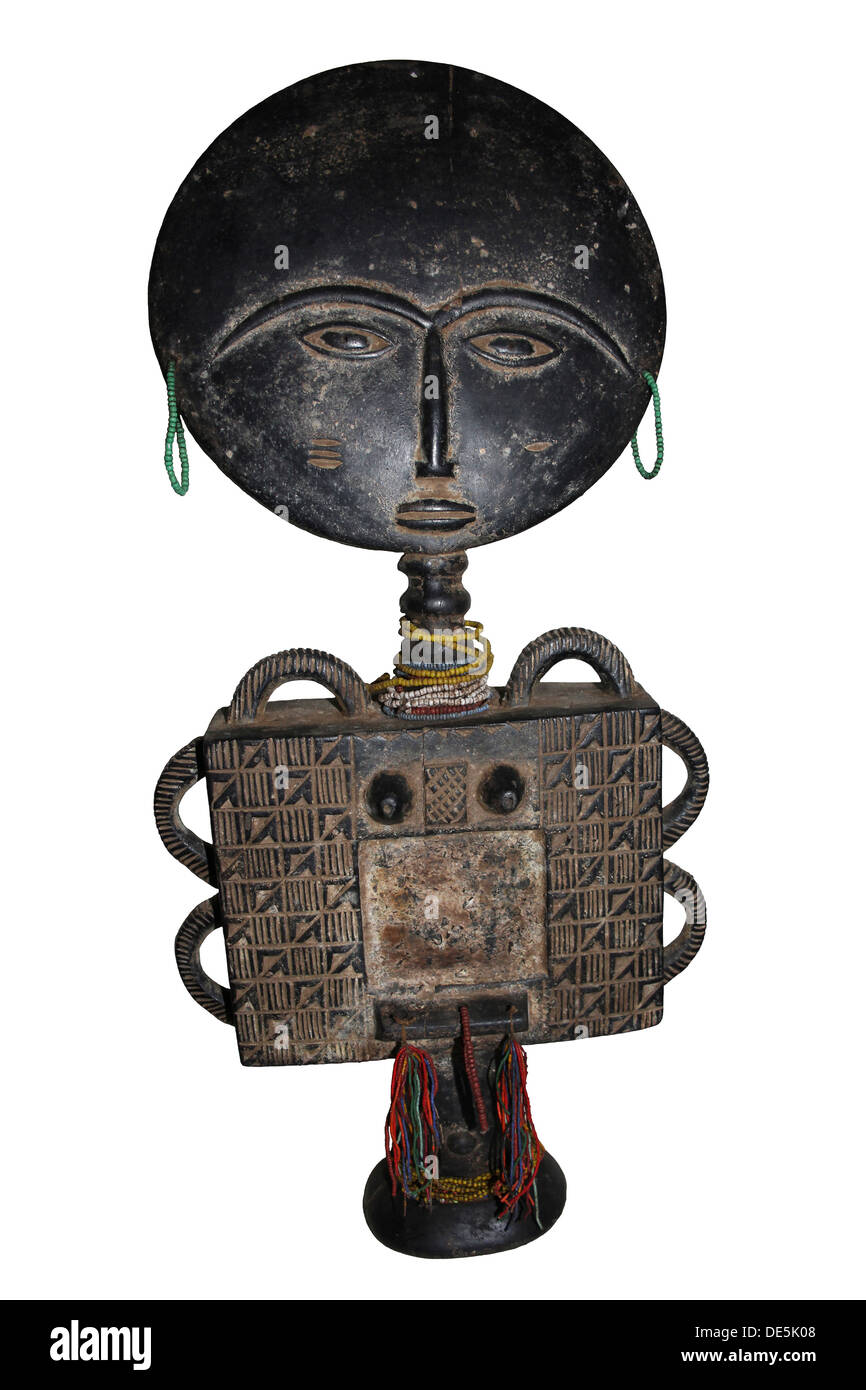 Poupée de fécondité Akuaba Ghana sculptés avec une jaquette qui aurait eu lieu à l'origine d'un petit miroir Banque D'Images
