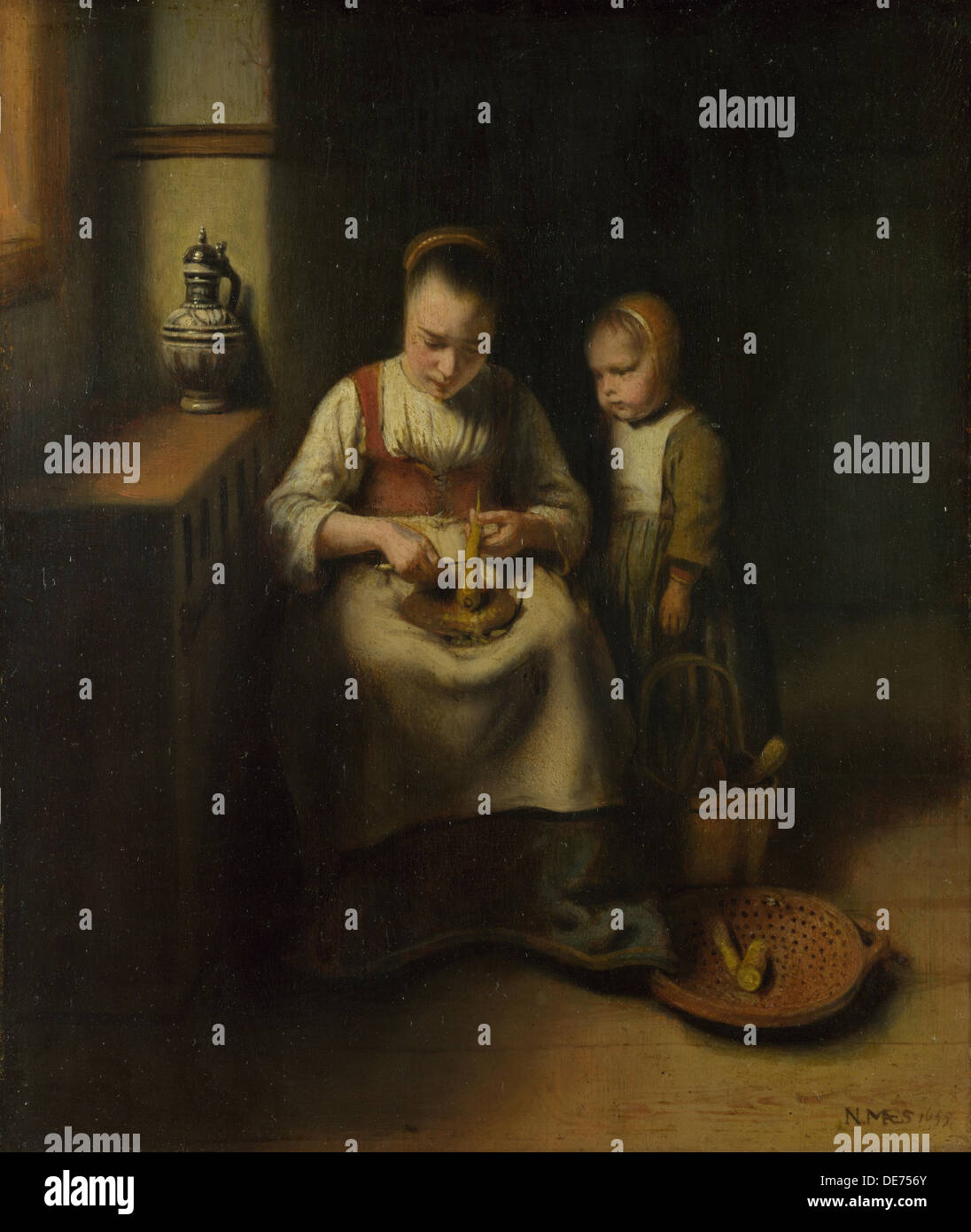 Une femme racler le panais, avec un enfant debout par elle, 1655. Artiste : Maes, Nicolaes (1634-1693) Banque D'Images