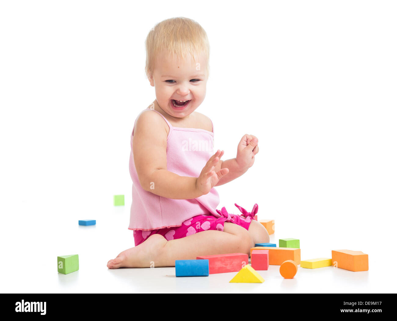 Jeune fille jouant avec des jouets Banque D'Images