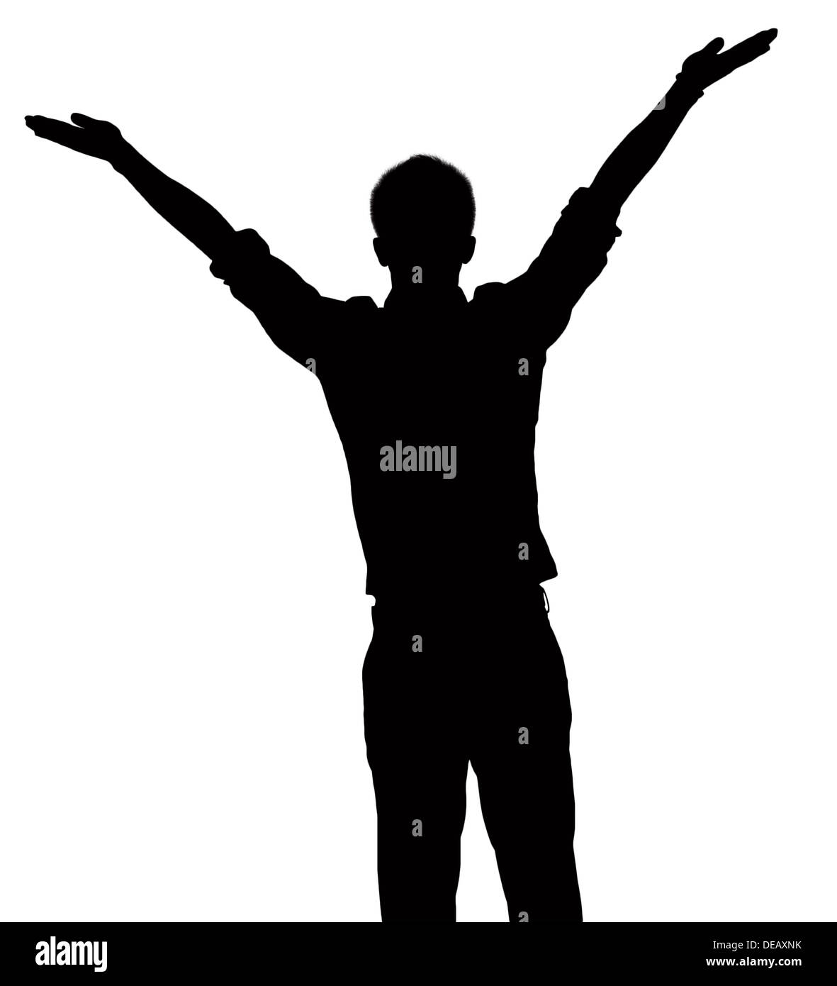 Silhouette of woman with arms raised. Banque D'Images