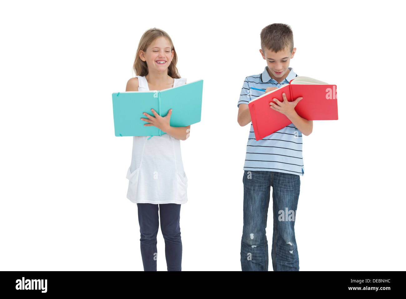 Frère et sœur faisant leurs devoirs ensemble Banque D'Images