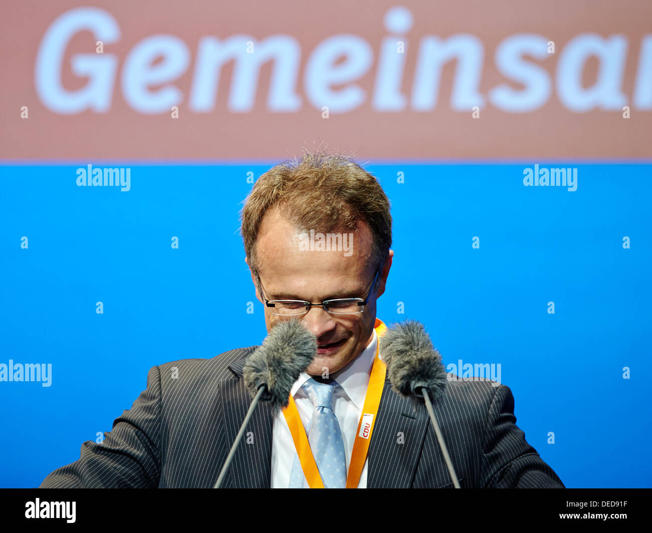 Potsdam, Allemagne. 16e Août, 2013. Dans le programme de la campagne électorale 2013, Angela Merkel, chancelière allemande et haut canditate du CDU, visites de Potsdam. / Photo : Le professeur Michael Schierack, Président de la CDU Brandenburg, lors de son discours de la campagne électorale pour les législatives 2013 à Potsdam. © Reynaldo Chaib Paganelli/Alamy Live News Banque D'Images