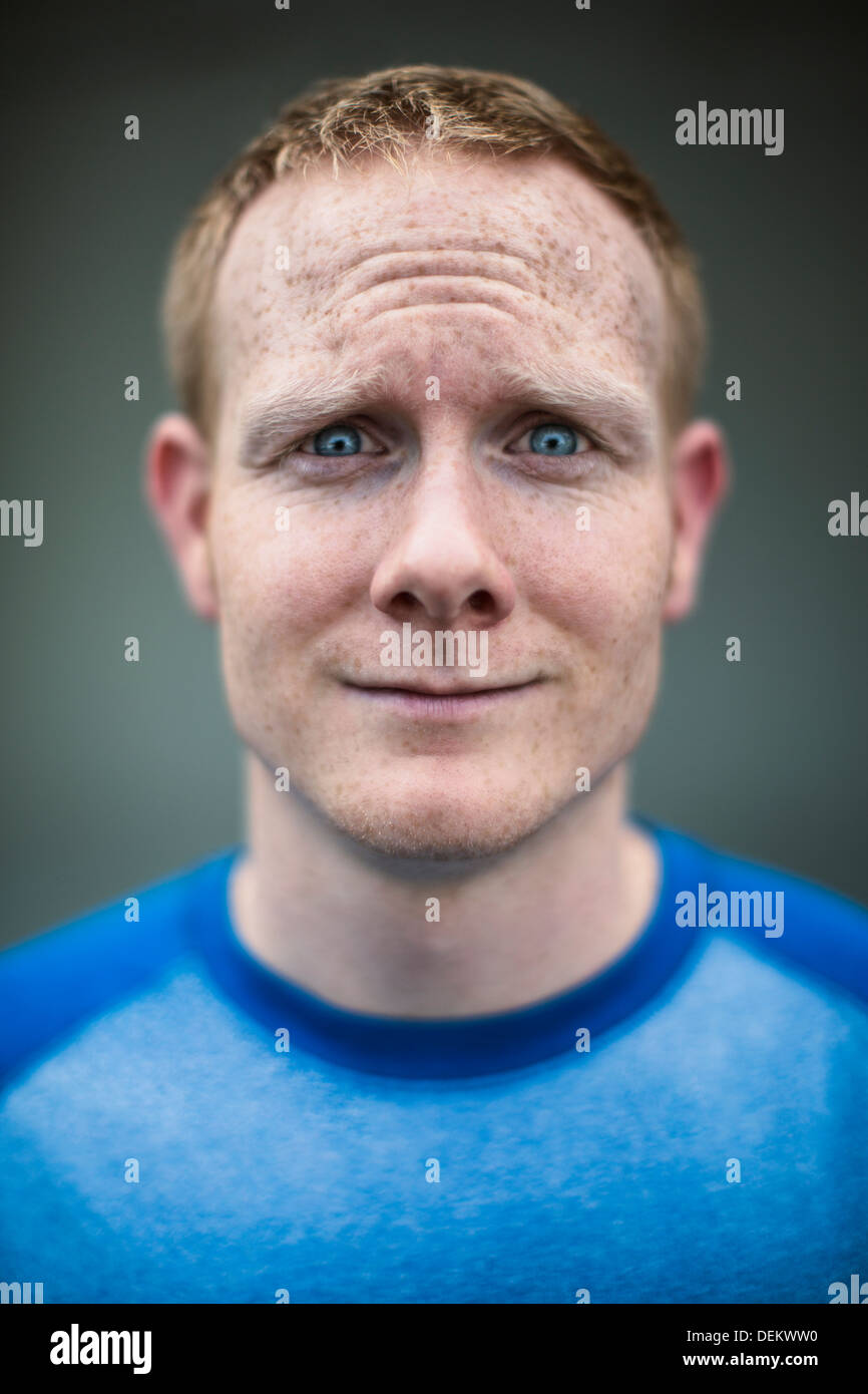 Close up of Caucasian man making a face Banque D'Images