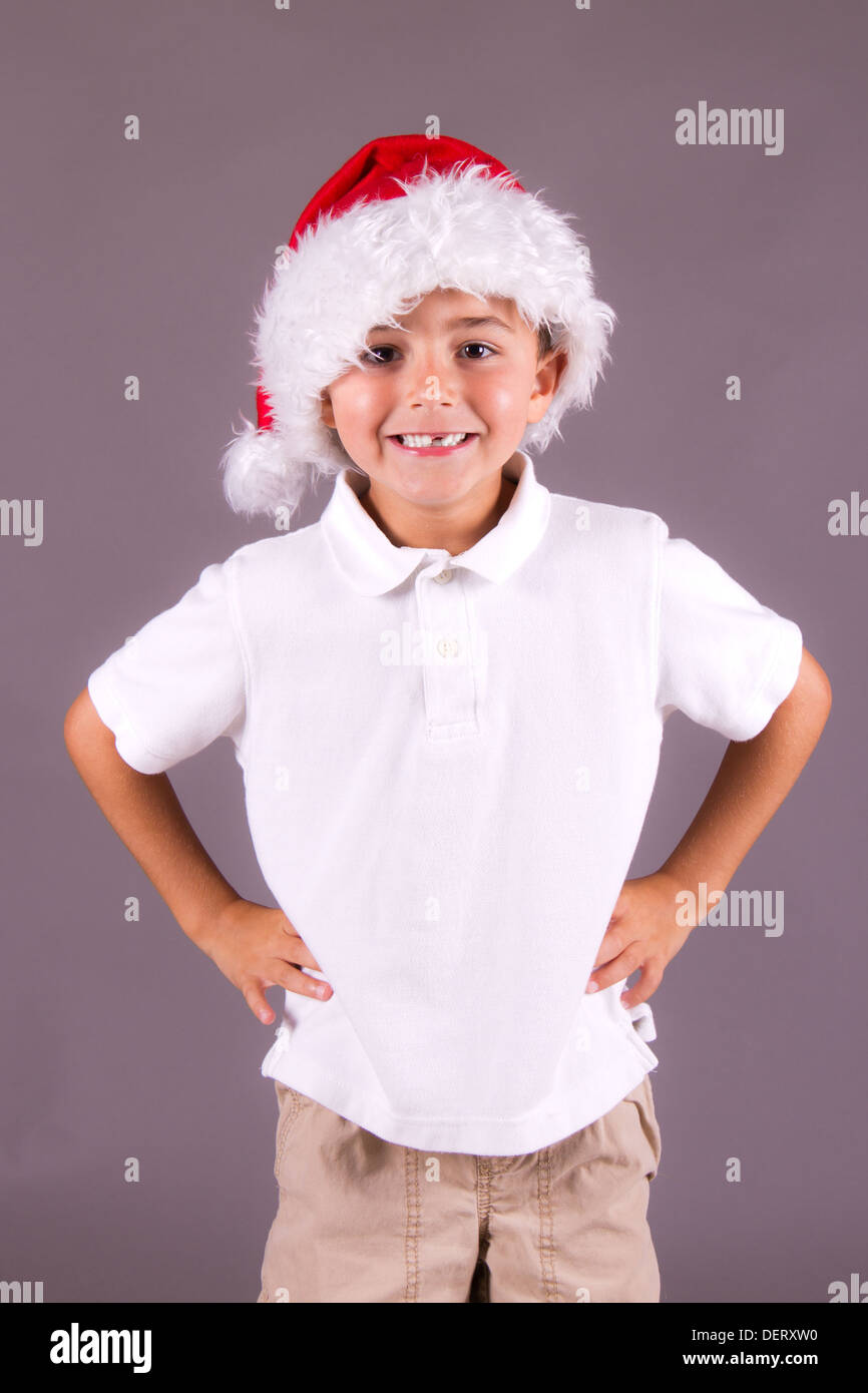 Happy boy with Santa hat Banque D'Images