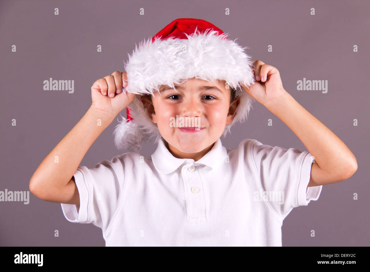 Little Boy with Santa hat Banque D'Images