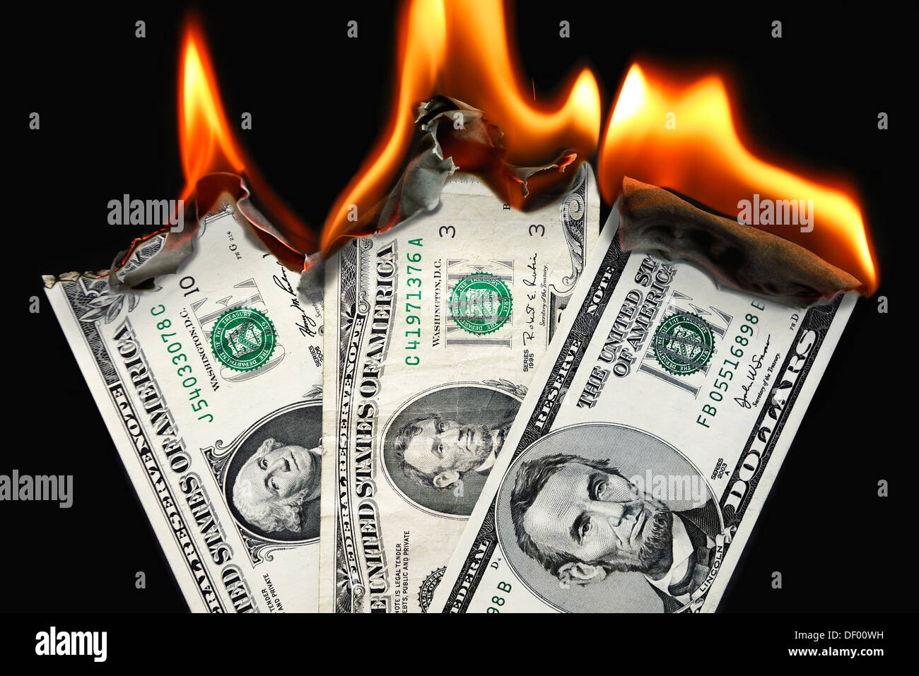 Les marques de brûlure, l'endettement de l'état du dollar des Etats-Unis, Dollarnoten Staatsverschuldung der Brennende, USA Banque D'Images