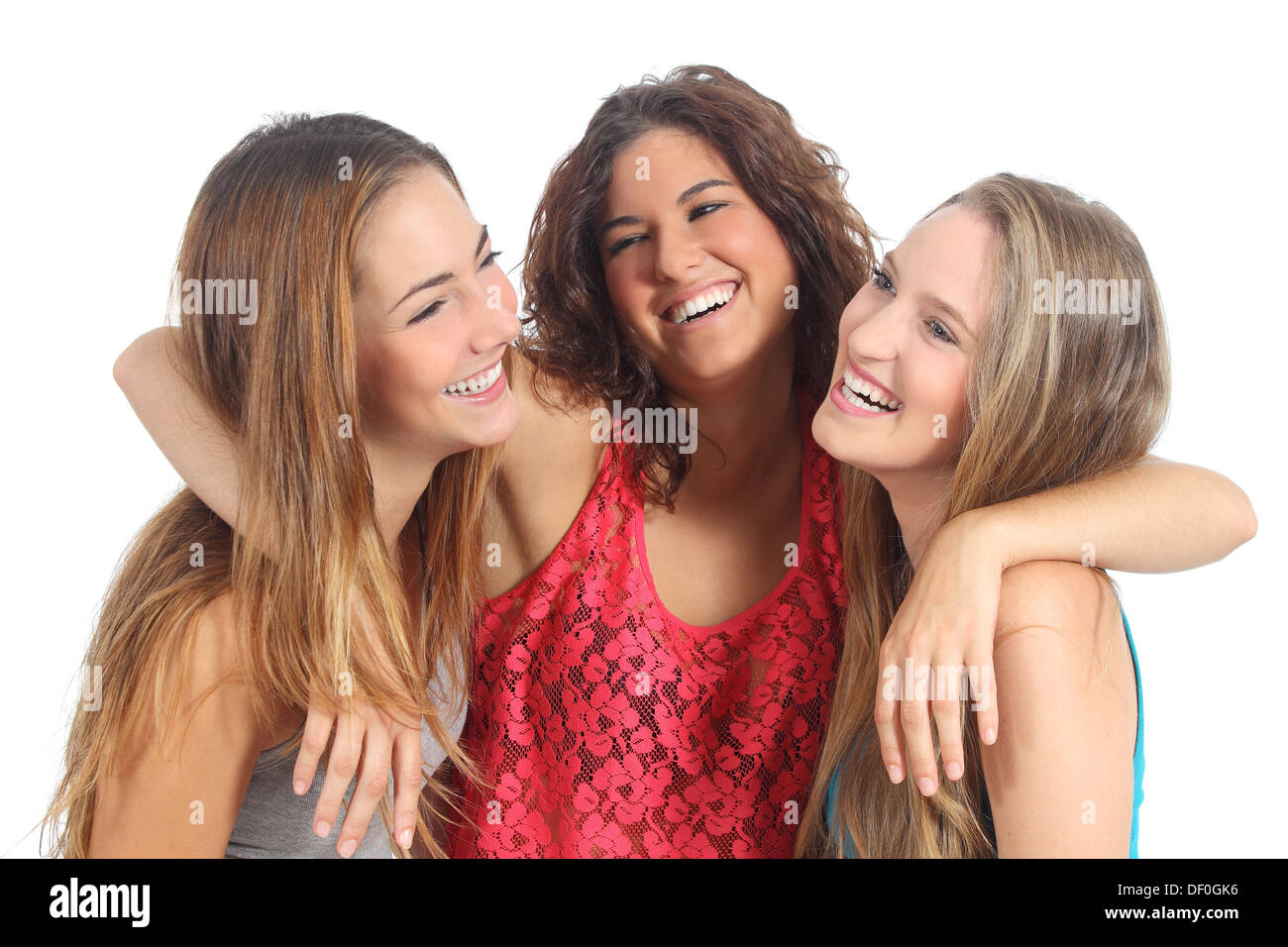 Groupe de trois filles hugging heureux isolé sur fond blanc Banque D'Images