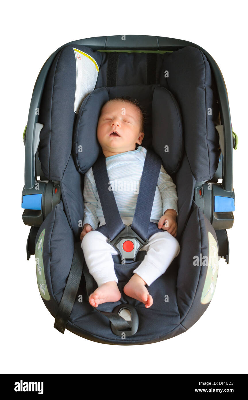 Garçon nouveau-né est en train de dormir dans un siège de voiture Banque D'Images
