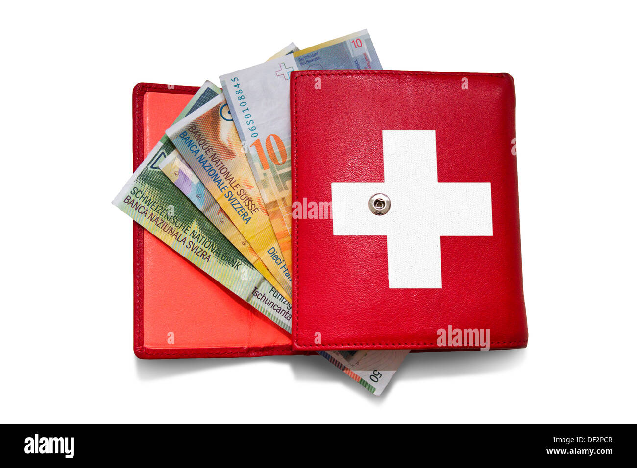 Portefeuille rouge avec des billets en franc suisse Banque D'Images