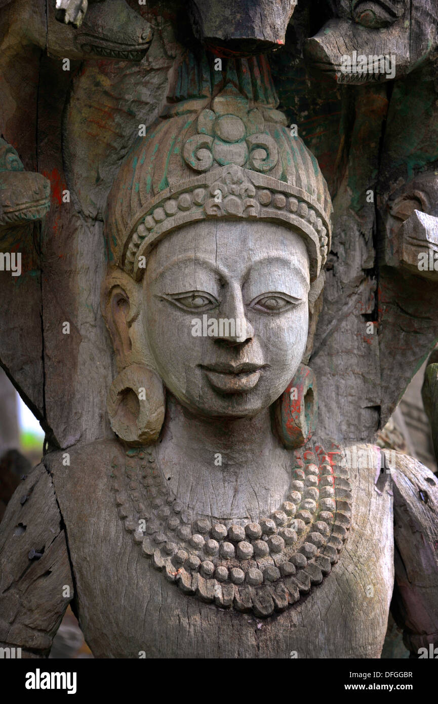 La figure en bois sculpté à l'ancienne Siam près de Bangkok, en Thaïlande. Banque D'Images