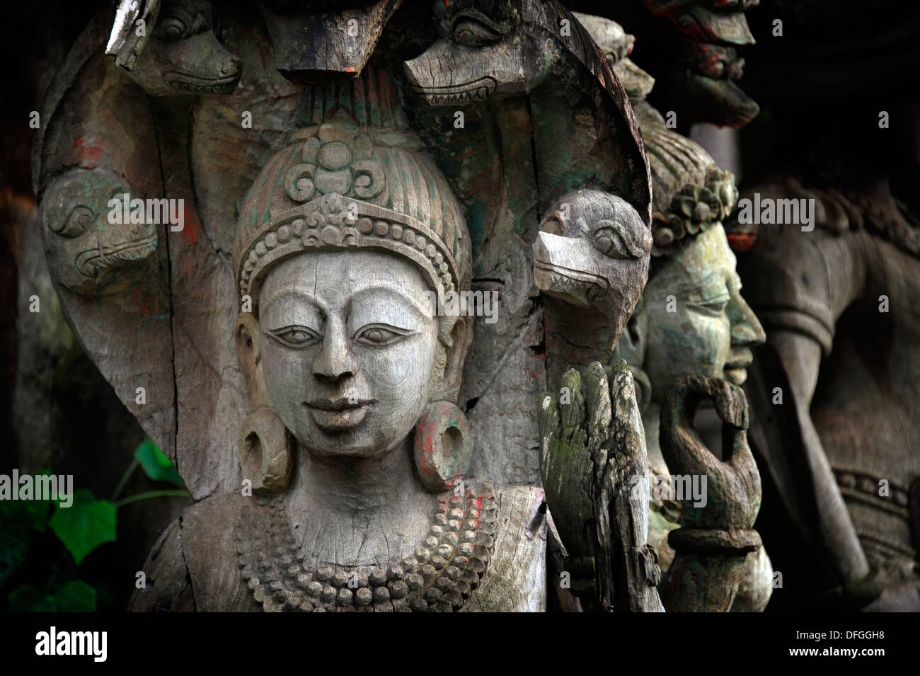Chiffres en bois sculpté à l'ancienne Siam près de Bangkok, en Thaïlande. Banque D'Images